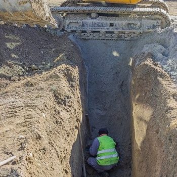 Worker working in trench 3